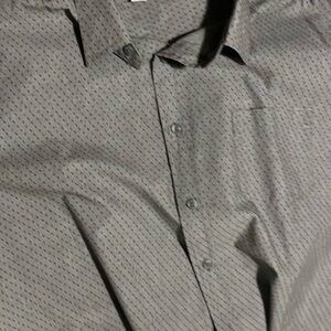 It is a button down shirt that is basically brand new